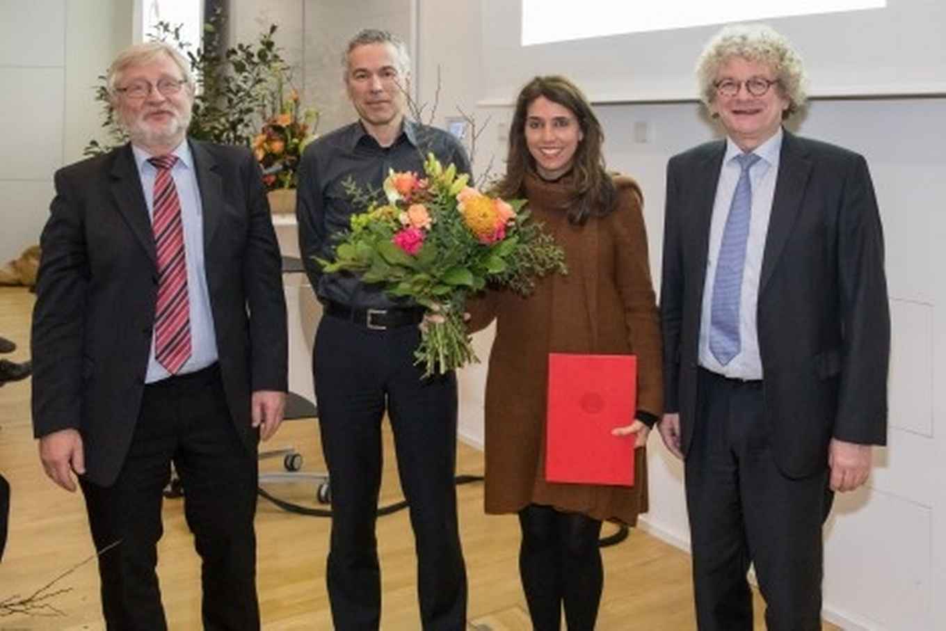 At the award ceremony (left): Prof. Heinrich Graener, Prof. Andreas Hemmerich, Prof. Cristiane Morais Smith, and Prof. Horst Weller. Credit: Andreas Vallbracht