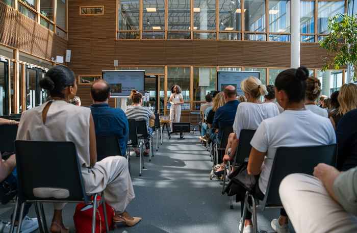 ABS student Amalia Stuger presents her AI solution during the event